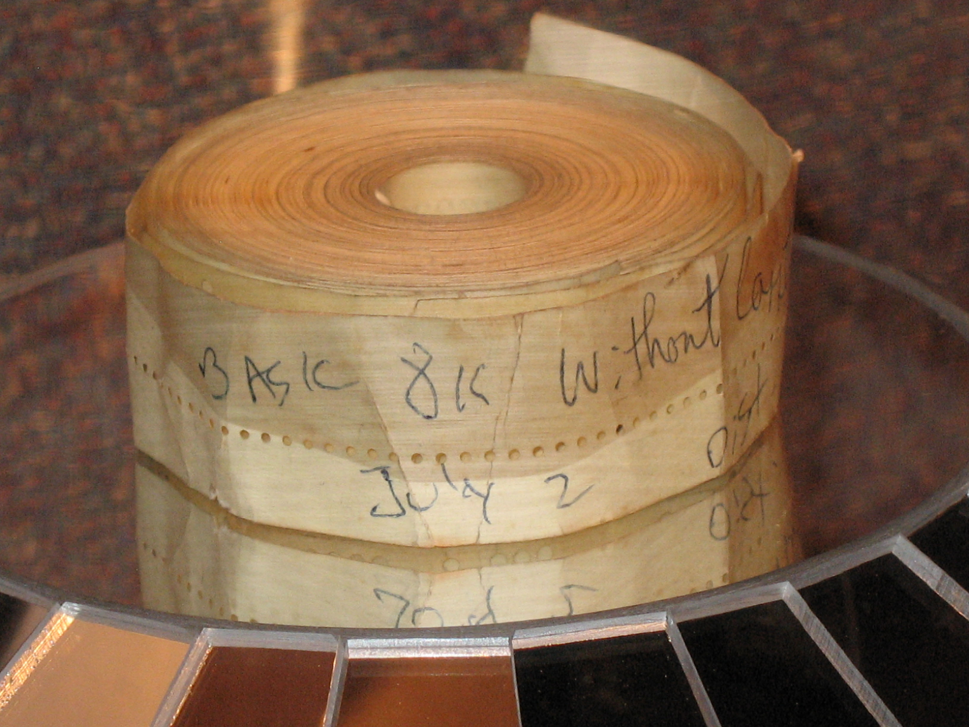 An original roll of Altair 8K BASIC on punched paper tape, written by Gates, Allen, and Davidoff and sold by MITS — the form in which the first Microsoft product reached its customers, and the form…