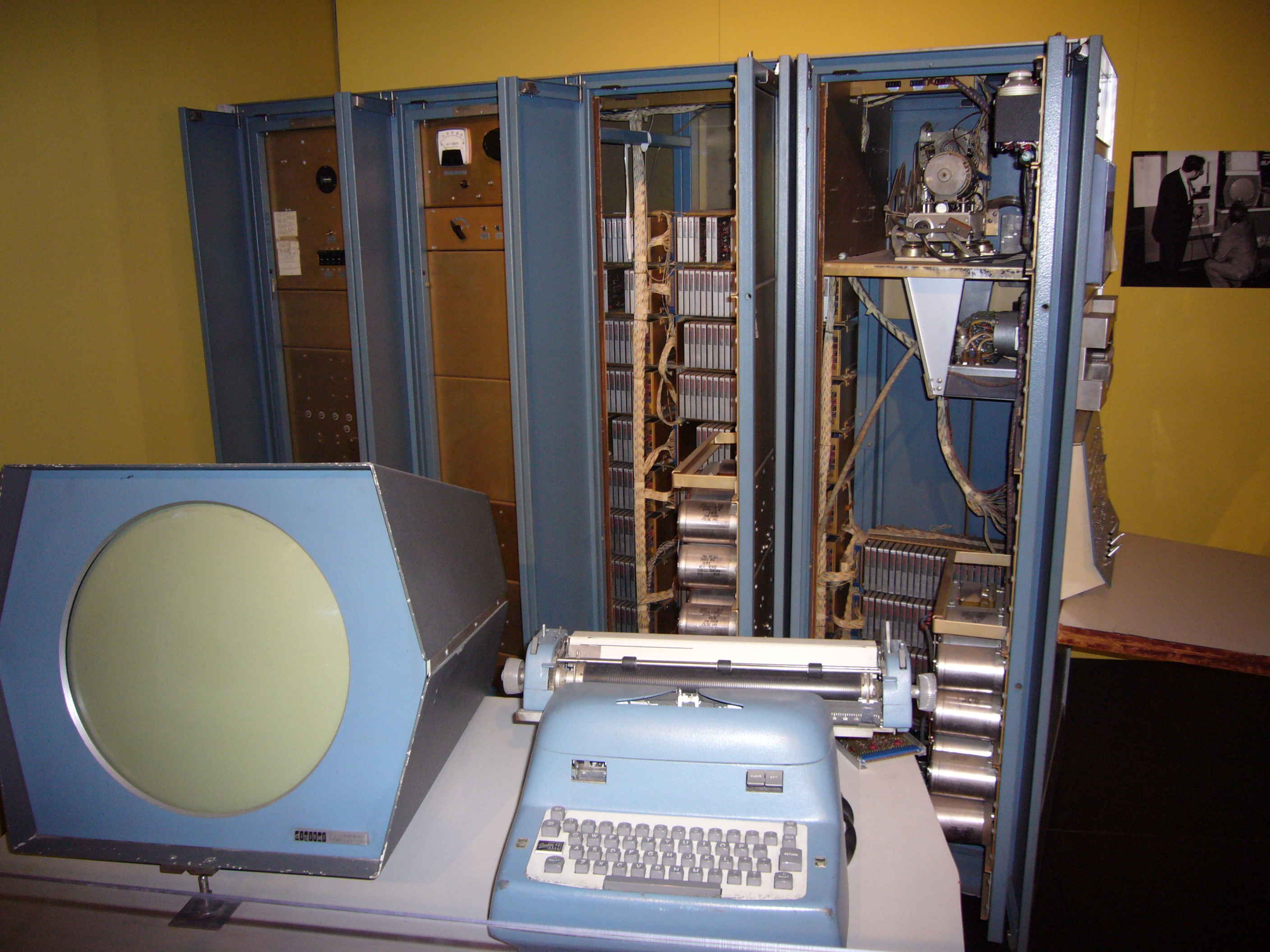 A restored DEC PDP-1, DEC's first computer and the spiritual ancestor of the PDP-8 — the interactive, single-user machine on whose Type 30 display the game Spacewar! was written in 1962.